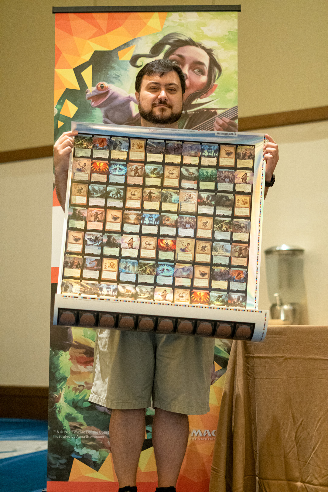Winner holding of a sheet of uncut cards